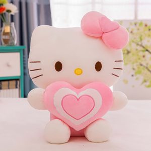 Il peluche di Hello Kitty con un cuore su un tavolo